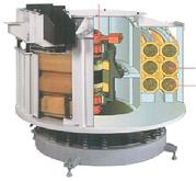 Continuous vibratory high volume impingment free finishing machine