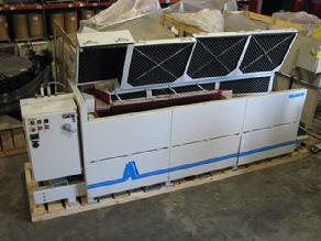 Continuous vibratory deburring machine